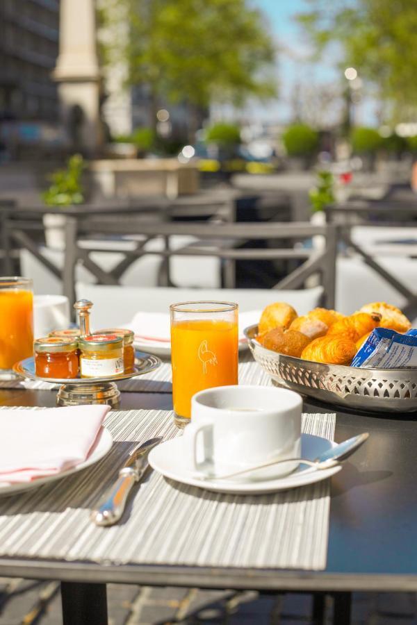 白鹤酒店 日内瓦 外观 照片 Breakfast at the hotel