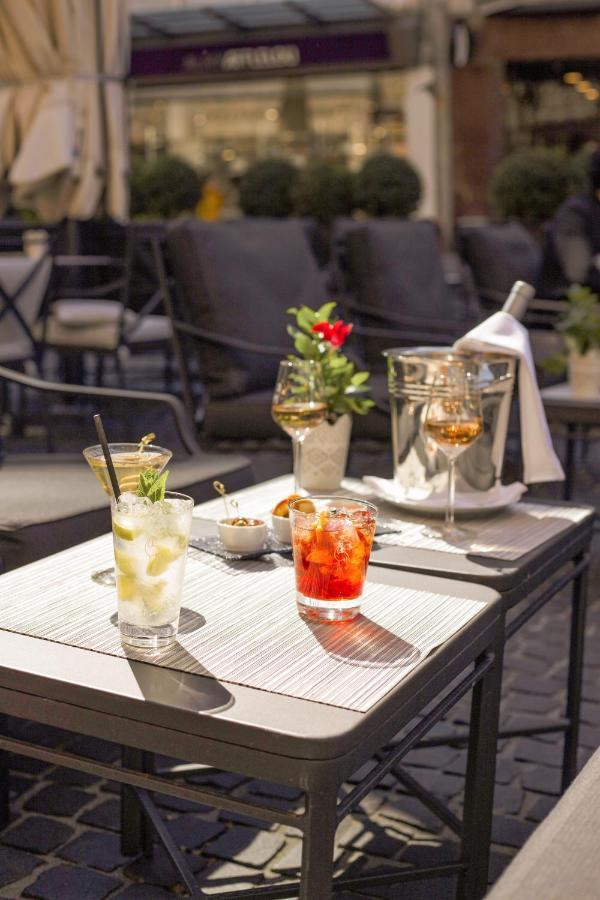 白鹤酒店 日内瓦 外观 照片 Cocktails at the hotel